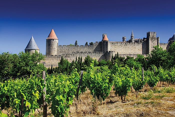 Image of Carcassone vineyards and the walled city from FranceToday.com