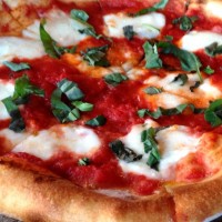 A margherita pizza from Louisville's popular Coals Pizza.