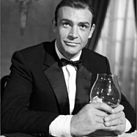 Sir Sean Connery as Ian Fleming's James Bond ... with a drink in his hands, of course.