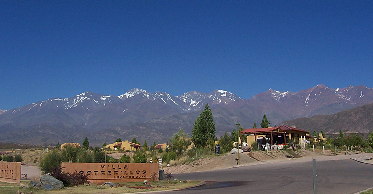 Argentina's Mendoza wine region lies within sight of the beautiful Andes, as seen in this view from Villa Potrerillos in Cuyo, Mendoza.